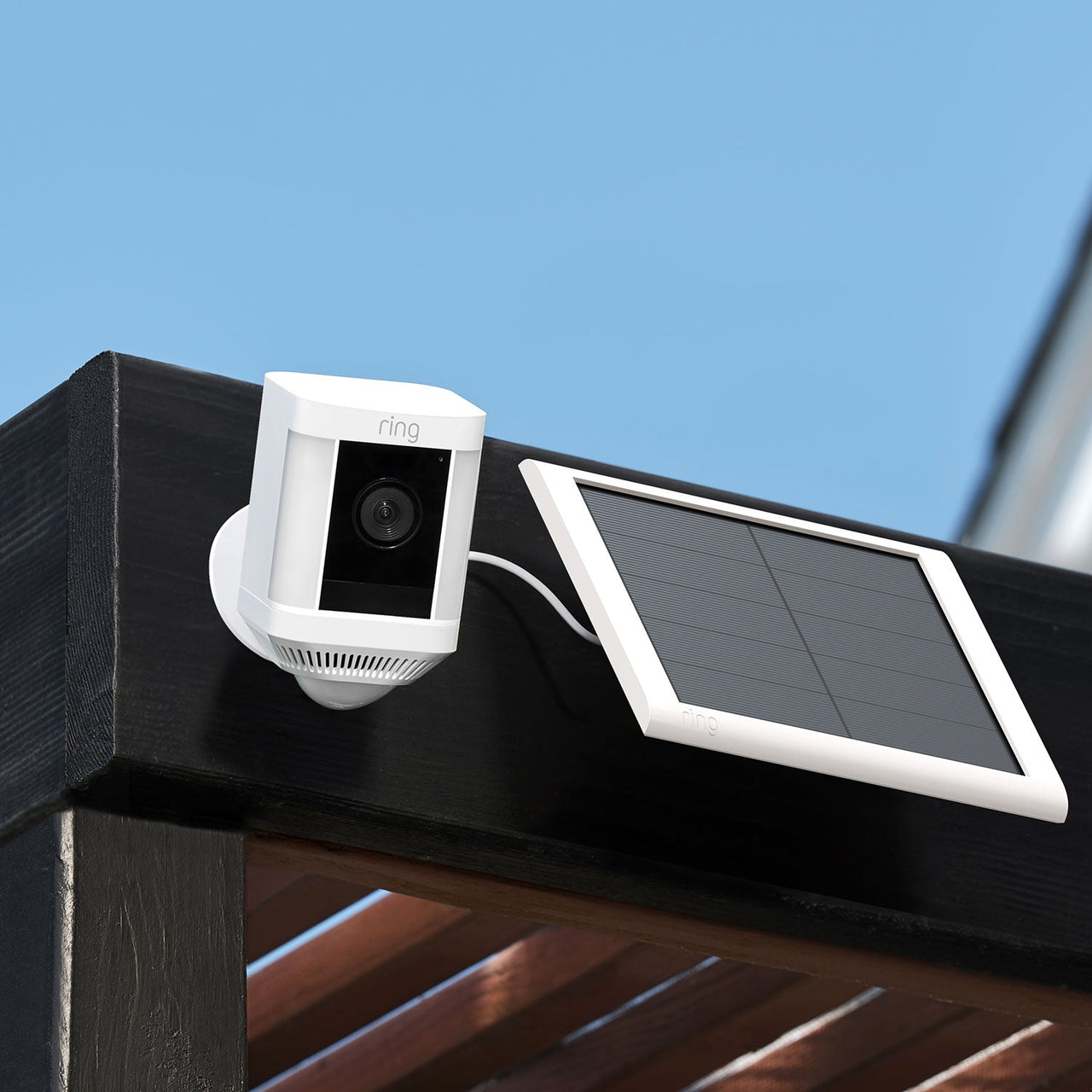 files/ring_spotlight_cam_plus_wired_white_hero_lifestyle_1500x1500_d491f84e-81cb-4e3f-a41a-240827de1b7e.jpg